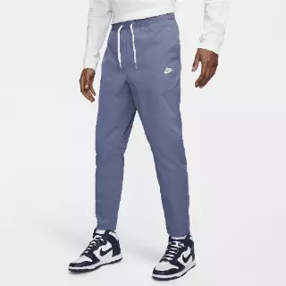 Nike Club Geweven broek met toelopende pijpen - Blauw