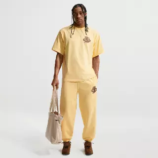 Nike Solo Swoosh fleecebroek met boorden voor heren - Geel