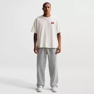 Nike Solo Swoosh fleecebroek met open zoom voor heren - Grijs