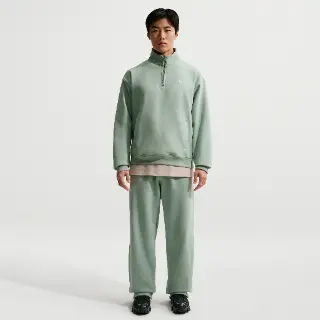 Nike Solo Swoosh fleecebroek met open zoom voor heren - Groen