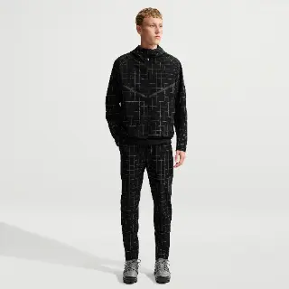 Nike Tech Dri-FIT Shori knit herenbroek met all-over print - Zwart