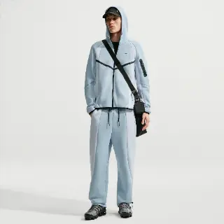 Nike Tech fleecebroek met kleurblokken en open zoom voor heren - Blauw