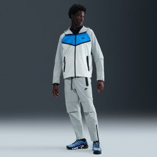 Nike Tech geweven herenbroek met open zoom - Grijs