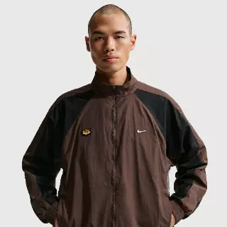 Nike Tuned geweven trainingstop voor heren - Bruin