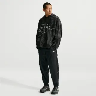 Nike Windrunner weerbestendige broek voor heren - Zwart