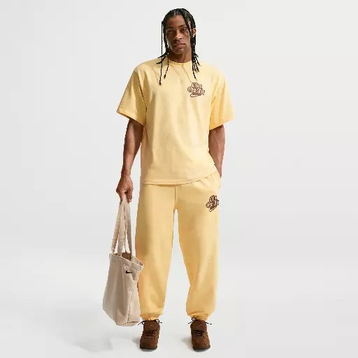Nike Solo Swoosh fleecebroek met boorden voor heren - Geel