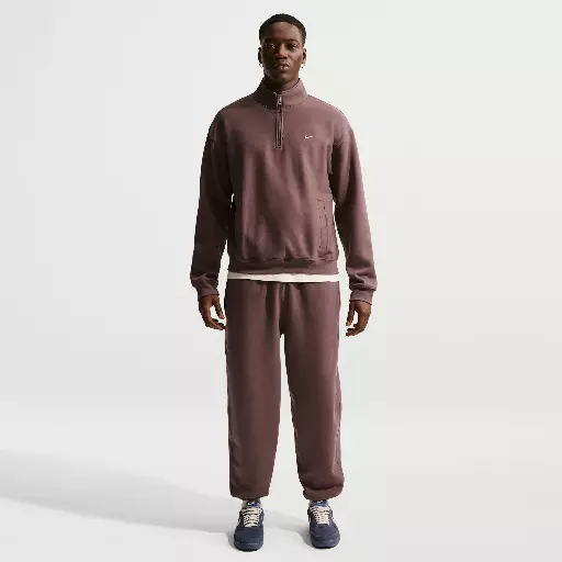 Nike Solo Swoosh fleecebroek met boorden voor heren - Paars