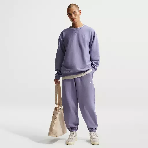 Nike Solo Swoosh fleecebroek met boorden voor heren - Paars