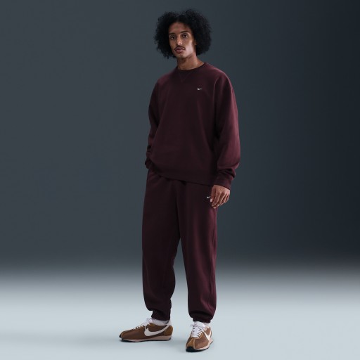 Nike Solo Swoosh fleecebroek met boorden voor heren - Rood