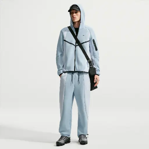 Nike Tech fleecebroek met kleurblokken en open zoom voor heren - Blauw