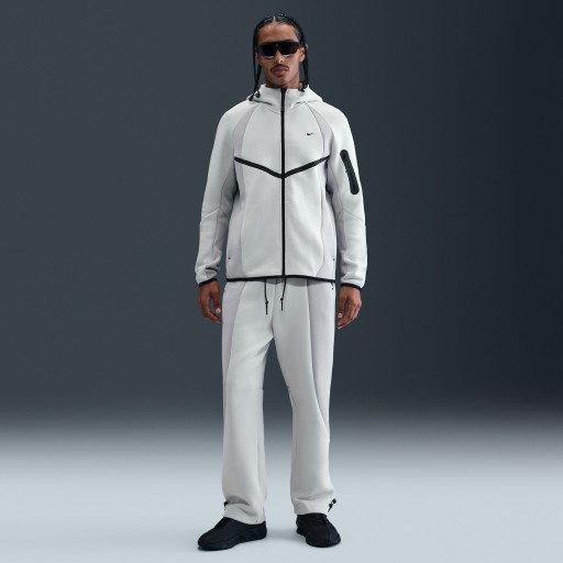 Nike Tech fleecebroek met kleurblokken en open zoom voor heren - Grijs