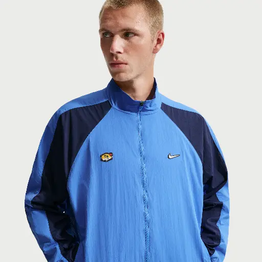 Nike Tuned geweven trainingstop voor heren - Blauw